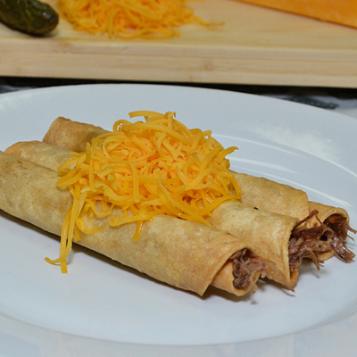 3 Rolled Tacos with Cheese